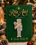 Rita Adel Designs Needle Minder ~ Blue & White Nutcracker, Handcrafted Stitching Accessory, Needle Dock, Enamel, Needlework Tool