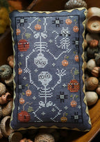 PLUM STREET SAMPLERS "Bony Bunch"  Counted Cross Stitch Pattern  Pumpkin, Autumn, Halloween Decor, Skeletons, Black Cat, Paper Pattern