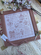 Pansy Patch Quilts and Stitchery "Pink Peacock Sampler" Counted Cross Stitch Pattern, Needlework Marketplace 2025