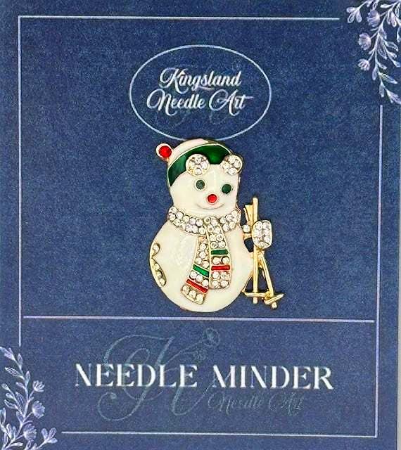 KINGSLAND NEEDLE MINDER ~ Skiing Snowman Needle Minder, Needle Dock, Swarovski Crystal Enamel Magnet, Needle Garage, Needleminder