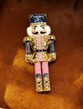 Nutcracker Needle Minder, Enamel Stitching Accessory, Crystal Embellished, Magnetic Needle Holder